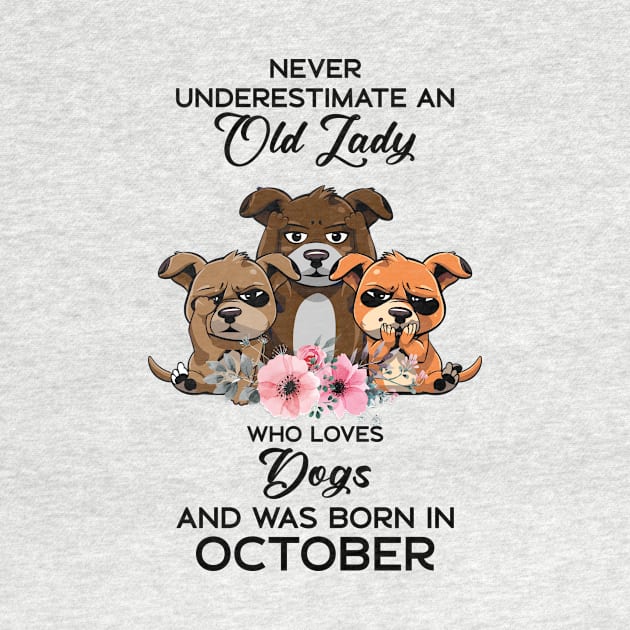 Never Underestimate An Old Woman Who Loves Dogs And Was Born In October by Happy Solstice